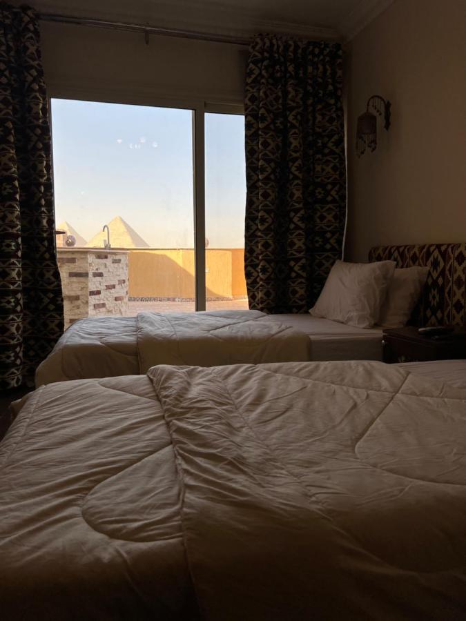 Отель Bedouin Pyramids View Kafrat al Jabal Экстерьер фото